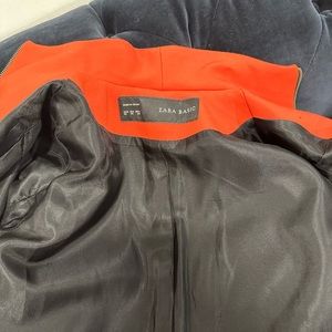 Orange zipped coat